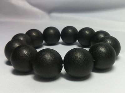 Amber bracelets, black, texture